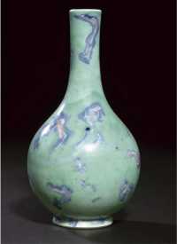 early 18th century An apple green ground bottle vase